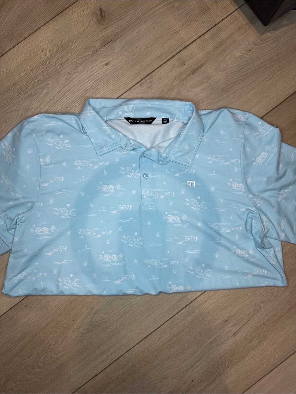 NWOT Travis Mathew Pale Blue Printed Polo